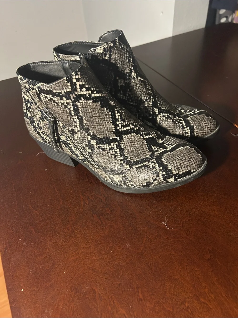 Arizona Jean Company Snake-Print Ankle Booties in Black and Cream